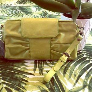 Joanel lime wristlet leather bag